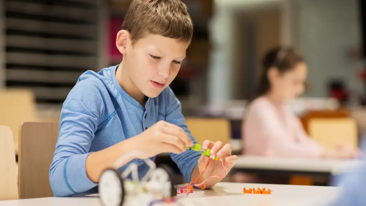 Elementary-aged male student learns robotics and STEM in the classroom.