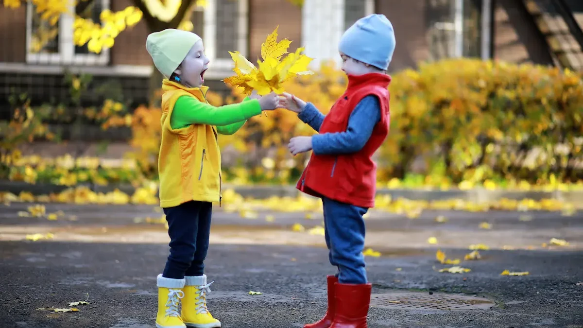 Two children show gratitude in Autumn.